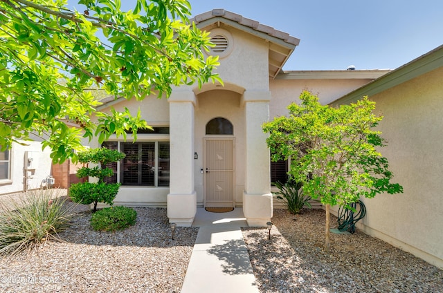 11092 N Eagle Crest Dr, Tucson, AZ 85737 - view of exterior entry featuring stucco siding