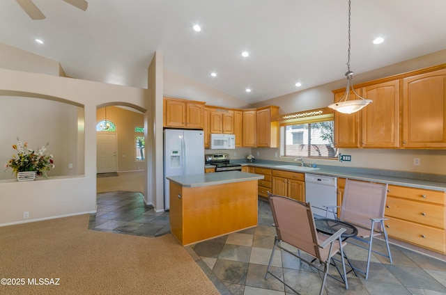 11092 N Eagle Crest Dr, Tucson, AZ 85737 - kitchen featuring white appliances, arched walkways, a kitchen island, a sink, and vaulted ceiling
