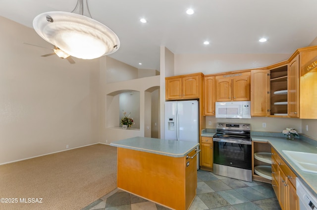 11092 N Eagle Crest Dr, Tucson, AZ 85737 - kitchen with white appliances, a center island, light countertops, open shelves, and vaulted ceiling