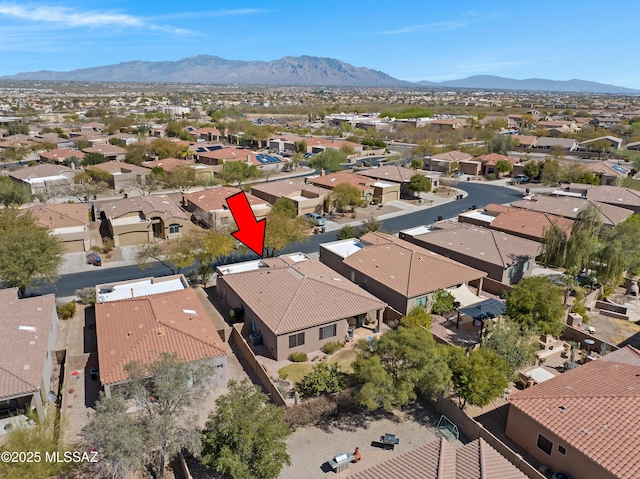 bird's eye view featuring a residential view and a mountain view