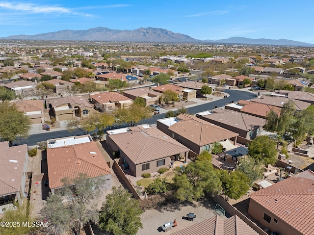 drone / aerial view with a residential view and a mountain view