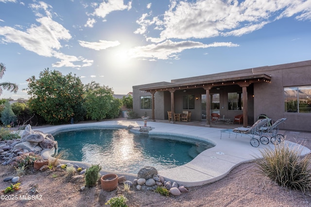 pool with a patio