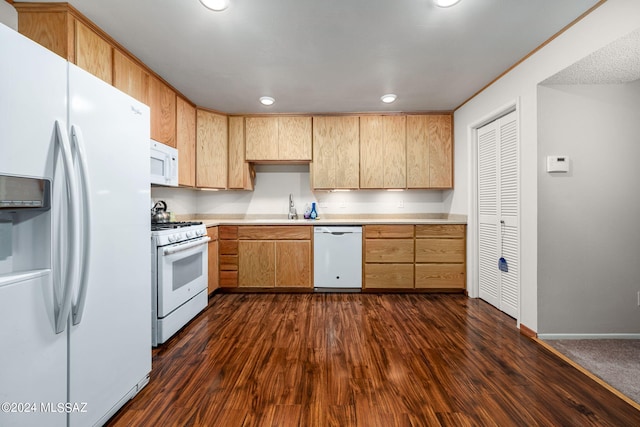 kitchen featuring white appliances, recessed lighting, light countertops, and dark wood-style flooring