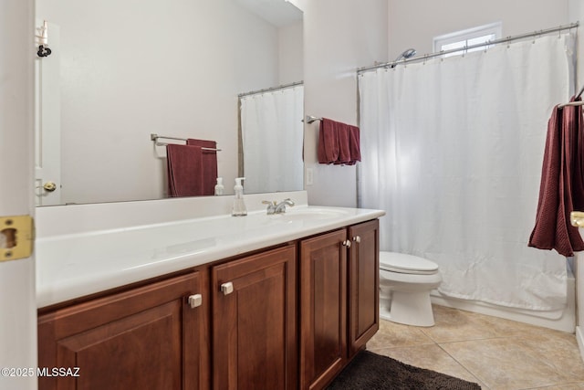 full bath featuring tile patterned flooring, toilet, vanity, and shower / bath combo