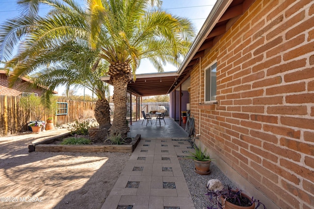 view of patio / terrace with outdoor dining area and a fenced backyard