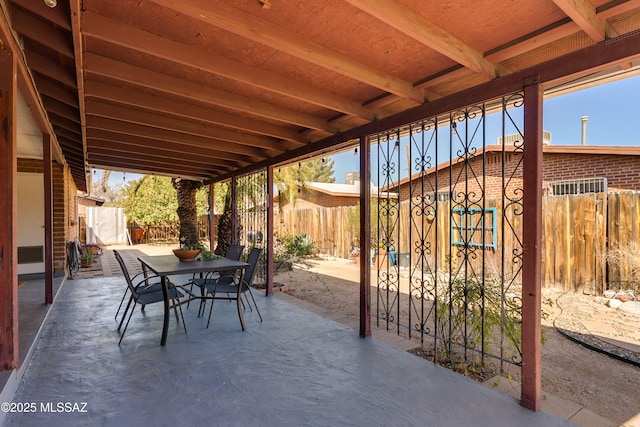 view of patio / terrace featuring outdoor dining space and a fenced backyard