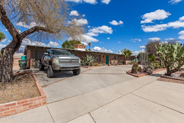 view of front of property with an attached garage and driveway