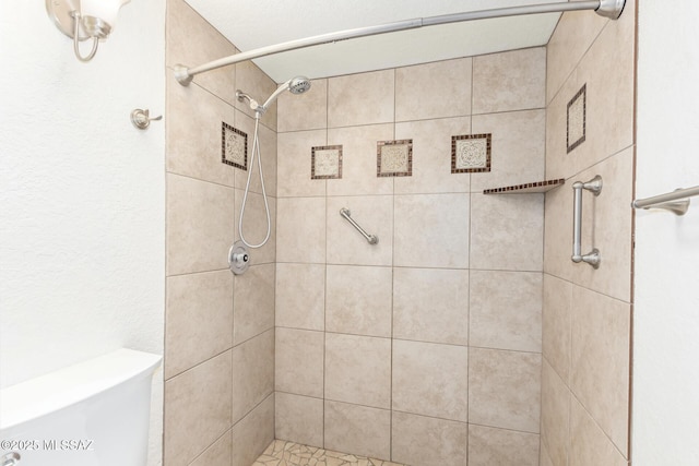 bathroom featuring a shower stall