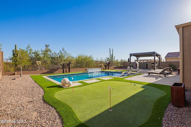 view of swimming pool featuring a fenced in pool, a patio, a fenced backyard, and a hot tub