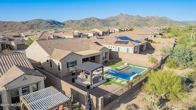 bird's eye view with a mountain view and a residential view