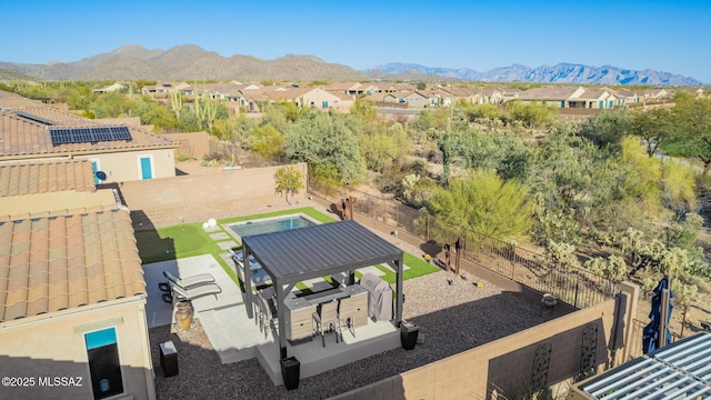 drone / aerial view with a mountain view and a residential view