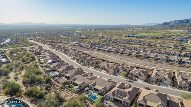 bird's eye view with a residential view and a mountain view