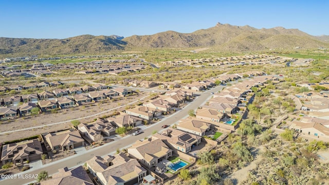 aerial view featuring a mountain view and a residential view