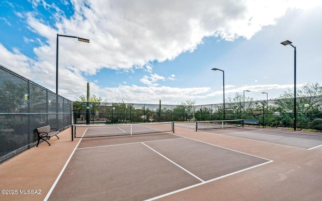 6909 W Cliff Spring Trl, Marana, AZ 85658 - view of tennis court featuring community basketball court