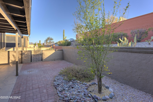 view of patio with a gate and a fenced backyard