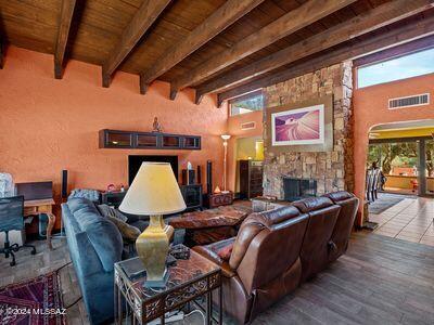 interior space featuring beam ceiling, visible vents, and wood ceiling