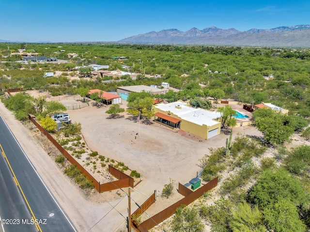 drone / aerial view featuring a mountain view