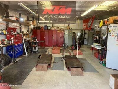 interior space featuring a workshop area and concrete flooring