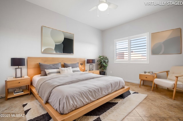 bedroom with tile patterned flooring and a ceiling fan