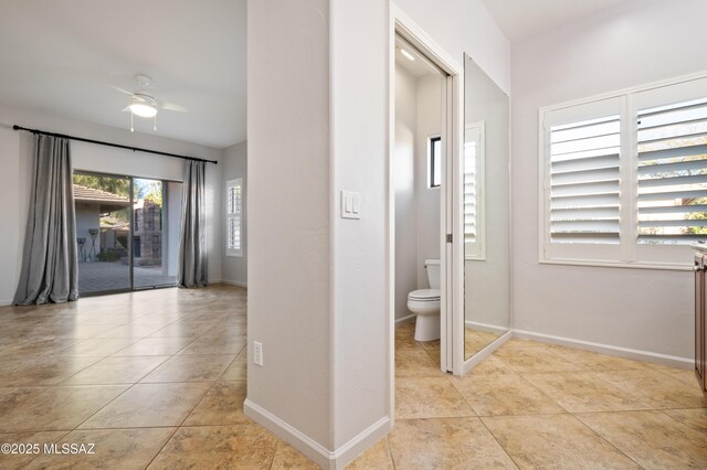 449 W Sunview Dr, Oro Valley, AZ 85755 - hall featuring light tile patterned flooring and baseboards