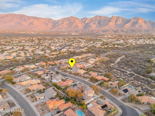 drone / aerial view featuring a mountain view and a residential view