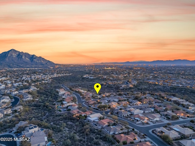 drone / aerial view with a mountain view and a residential view