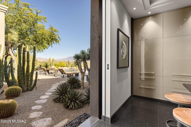 3978 N Canyon Ranch Dr, Tucson, AZ 85750 - interior space featuring a mountain view, light speckled floor, baseboards, and recessed lighting