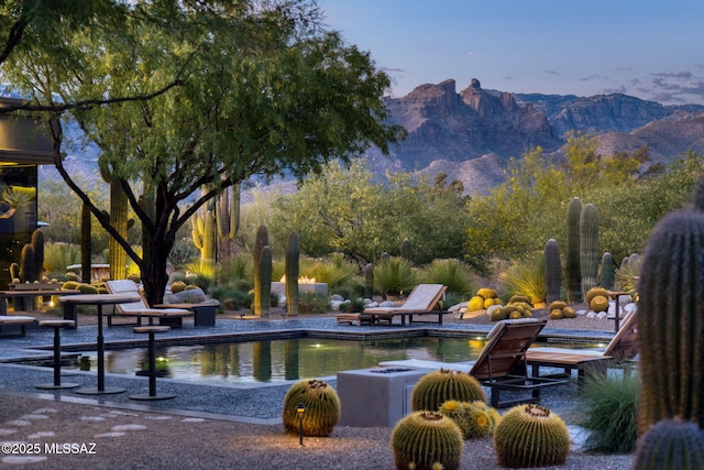 3978 N Canyon Ranch Dr, Tucson, AZ 85750 - surrounding community with a mountain view, a pool, and a patio