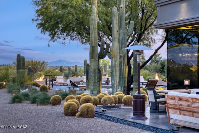 3978 N Canyon Ranch Dr, Tucson, AZ 85750 - view of property's community featuring a mountain view and a patio area