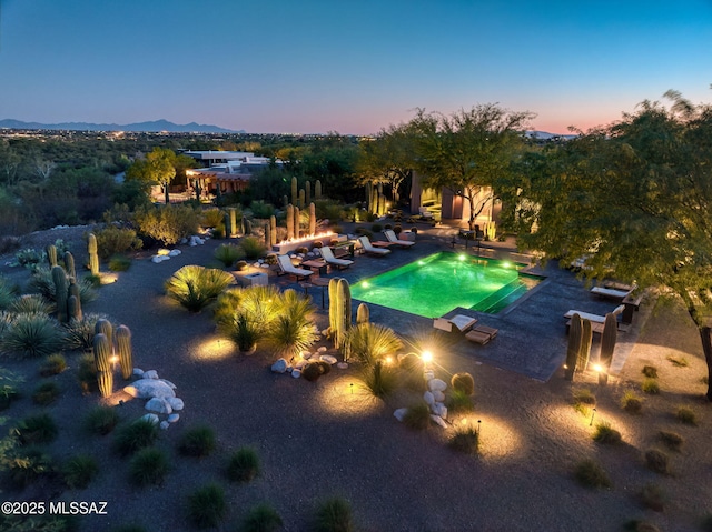 3978 N Canyon Ranch Dr, Tucson, AZ 85750 - pool at dusk with a mountain view