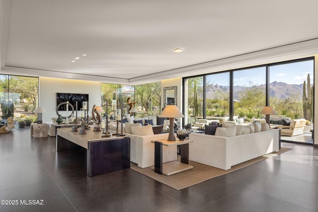 3978 N Canyon Ranch Dr, Tucson, AZ 85750 - living area featuring a wall of windows, healthy amount of natural light, and a mountain view