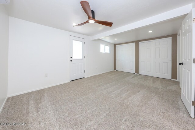 interior space with recessed lighting, two closets, baseboards, and carpet floors