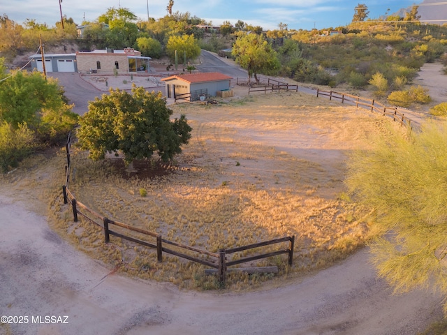 birds eye view of property featuring a rural view