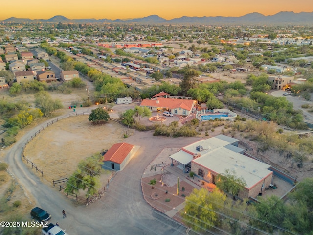 aerial view at dusk with a mountain view