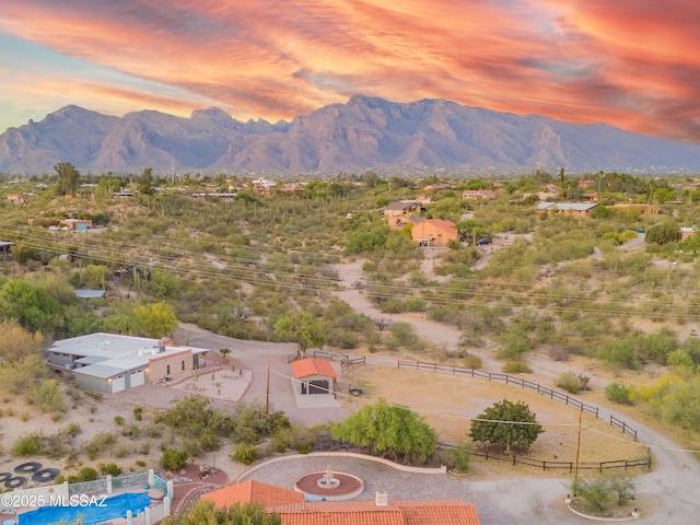 aerial view at dusk with a mountain view