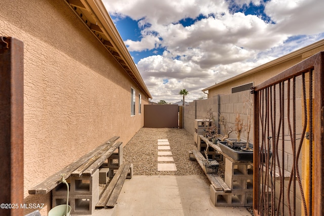 view of home's exterior featuring a fenced backyard and stucco siding