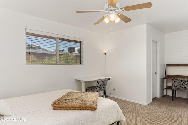 bedroom featuring baseboards, ceiling fan, and carpet flooring