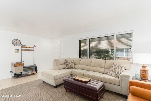 tiled living area with carpet flooring