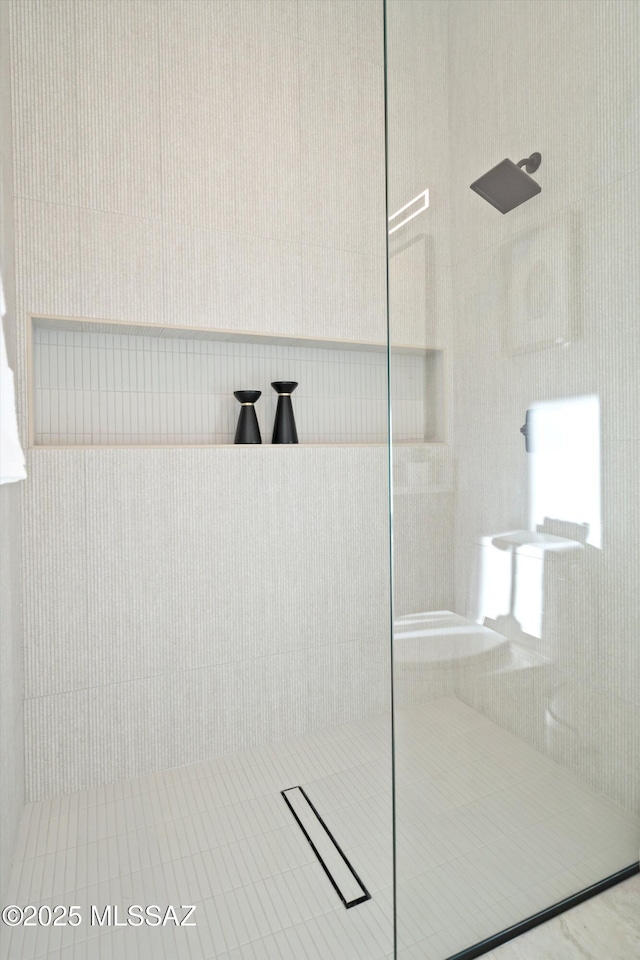 bathroom featuring a walk in shower