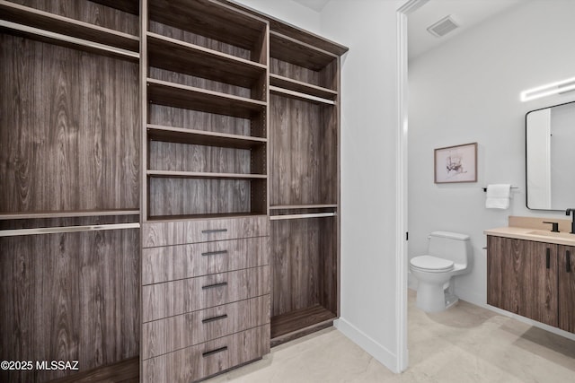 full bathroom featuring visible vents, toilet, and vanity