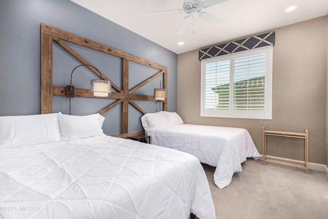 carpeted bedroom with a ceiling fan, recessed lighting, and baseboards