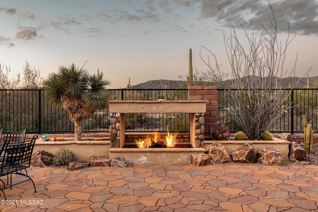 patio terrace at dusk with fence