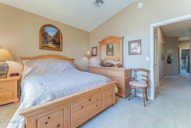 bedroom with baseboards, visible vents, lofted ceiling, and light carpet