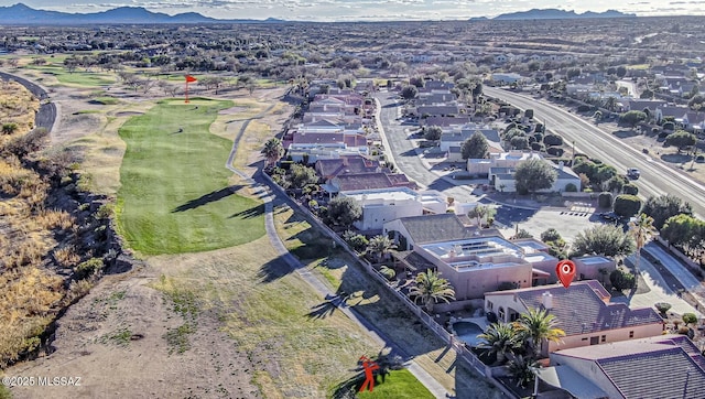 drone / aerial view featuring a mountain view and a residential view