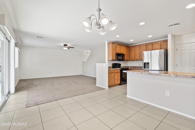 kitchen featuring light carpet, ceiling fan with notable chandelier, black appliances, and visible vents