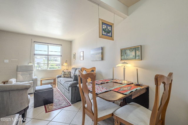 dining space with light tile patterned floors