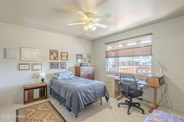 bedroom featuring light tile patterned flooring and ceiling fan