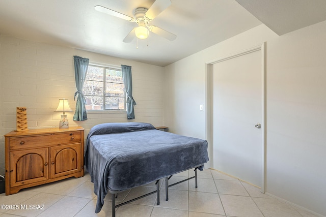 bedroom with light tile patterned floors and a ceiling fan