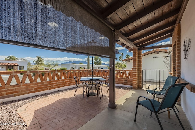 view of patio / terrace featuring outdoor dining space and a fenced backyard