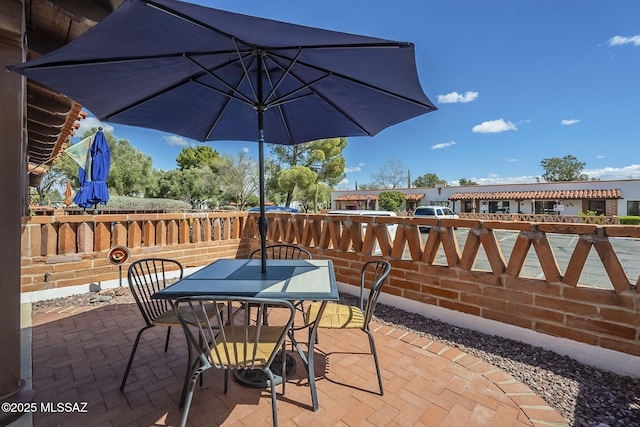 view of patio with outdoor dining area